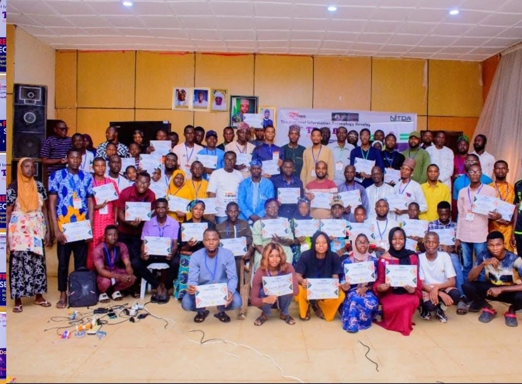 A full hall of trainees holding certificates at the NITDA free cybersecurity training